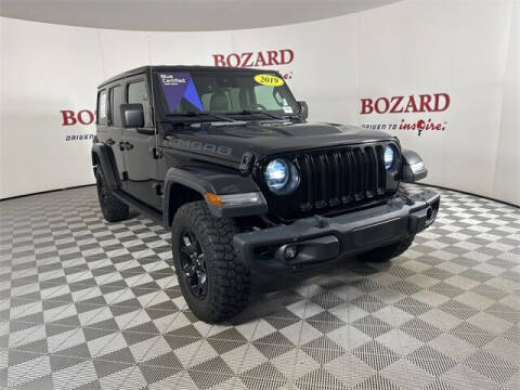 2019 Jeep Wrangler Unlimited for sale at BOZARD FORD in Saint Augustine FL
