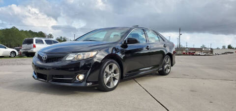 2014 Toyota Camry for sale at WHOLESALE AUTO GROUP in Mobile AL