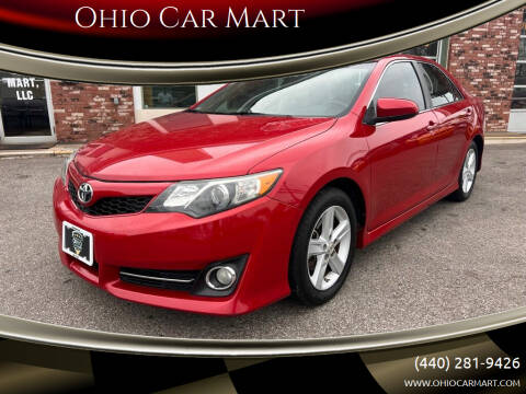 2013 Toyota Camry for sale at Ohio Car Mart in Elyria OH