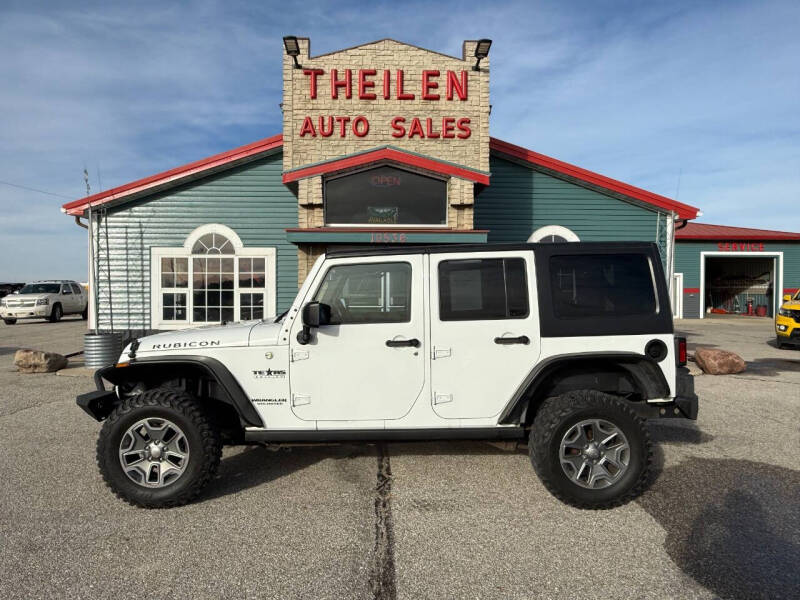 2015 Jeep Wrangler Unlimited for sale at THEILEN AUTO SALES in Clear Lake IA