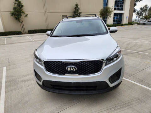 2017 Kia Sorento for sale at E and M Auto Sales in Bloomington CA