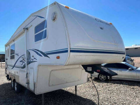 2004 Keystone Cougar for sale at BERKENKOTTER MOTORS in Brighton CO