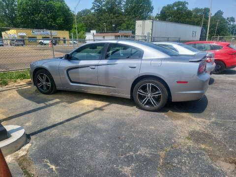 2013 Dodge Charger for sale at A-1 AUTO AND TRUCK CENTER in Memphis TN