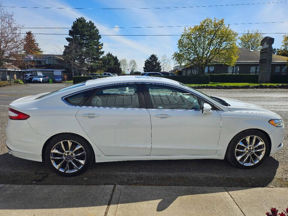 2015 Ford Fusion for sale at BENCHMARK AUTO SALES in Parkland, WA