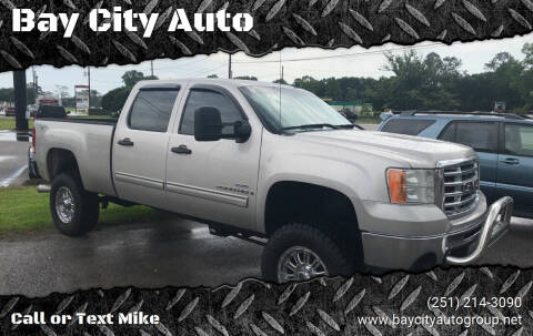 2007 GMC Sierra 2500HD for sale at Bay City Auto's in Mobile AL