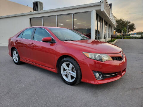 2013 Toyota Camry for sale at DELRAY AUTO MALL in Delray Beach FL