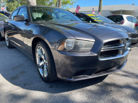 2014 Dodge Charger for sale at AFFORDABLE AUTO SALES OF STUART in Stuart FL