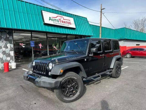 2015 Jeep Wrangler Unlimited for sale at AUTO TRATOS in Marietta GA