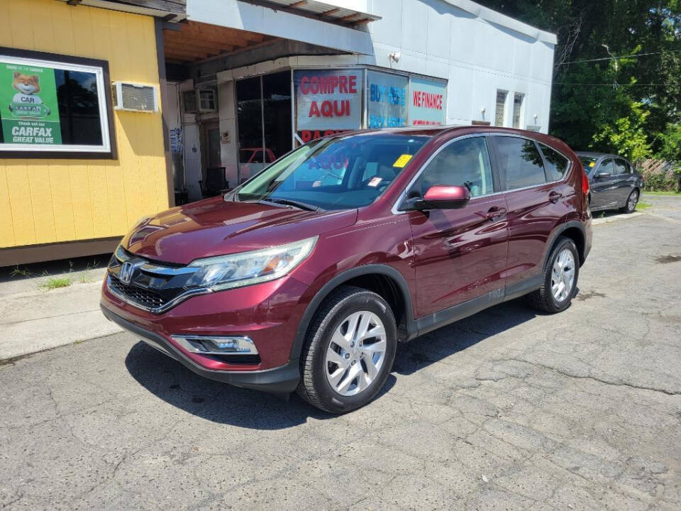 2016 Honda CR-V for sale at DAGO'S AUTO SALES LLC in Dalton, GA