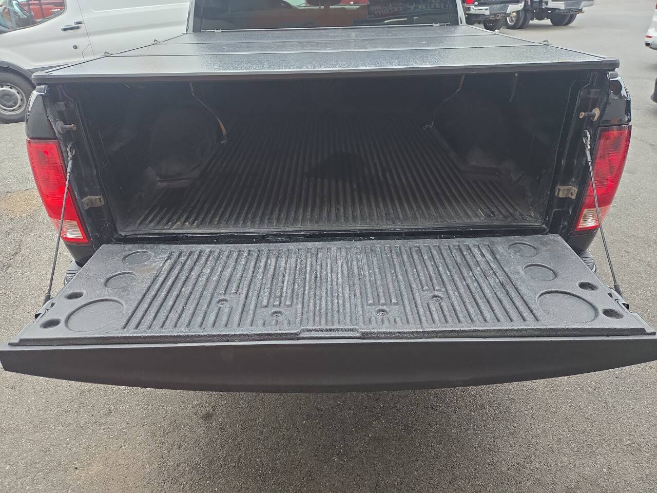 Black 2013 Ram 1500 Express 4x4 Express 4dr Crew Cab 5.5 ft. SB Pickup 73