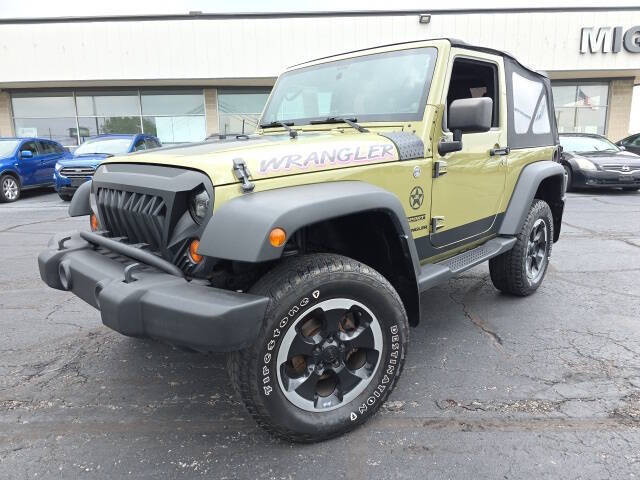 Used 2013 Jeep Wrangler Sport with VIN 1C4AJWAG8DL704869 for sale in Bellefontaine, OH