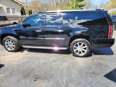 2011 GMC Yukon XL for sale at MADDEN MOTORS INC in Peru IN