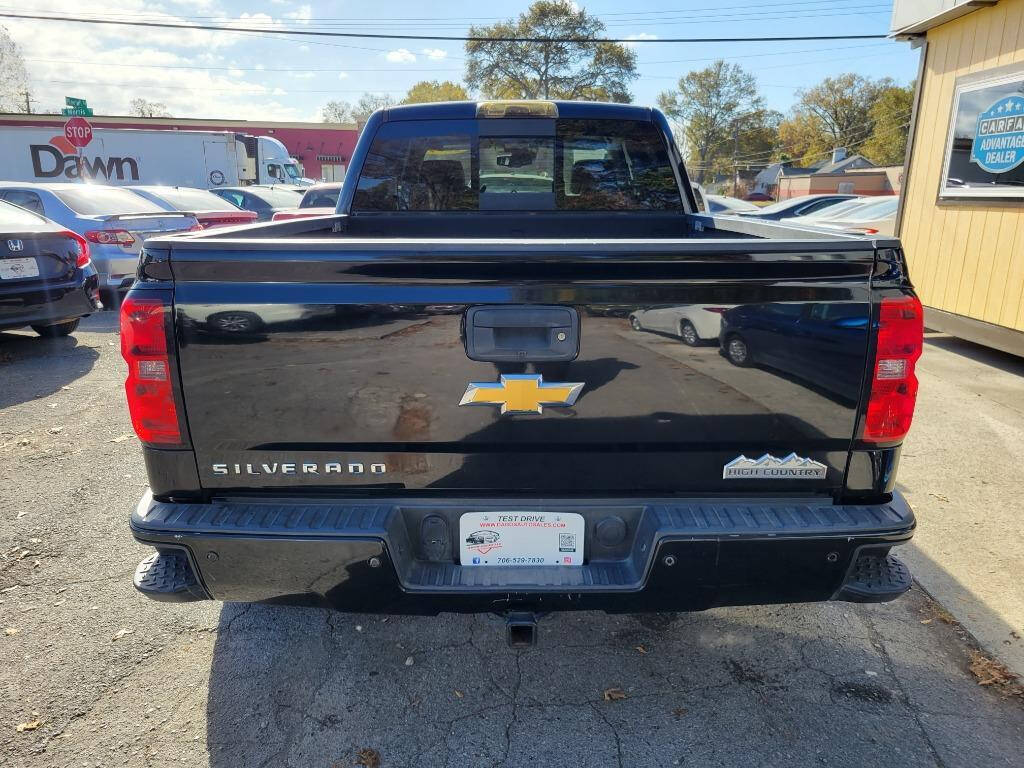 2014 Chevrolet Silverado 1500 for sale at DAGO'S AUTO SALES LLC in Dalton, GA