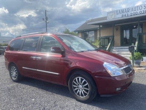 2012 Kia Sedona for sale at Lamar Auto Sales in North Charleston SC