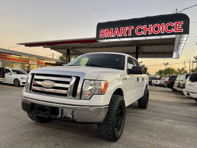 2009 Ford F-150 for sale at SMART CHOICE AUTO in Pasadena, TX