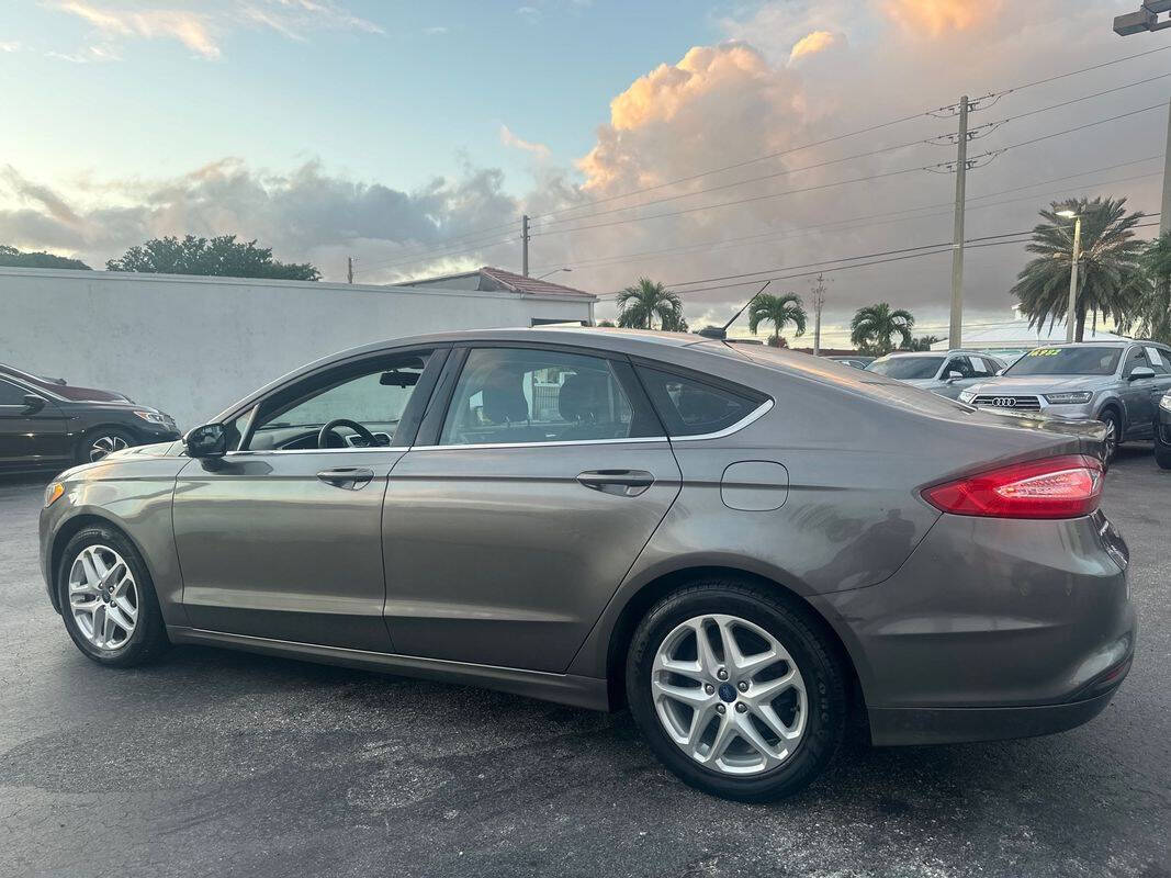 2014 Ford Fusion for sale at Tropical Auto Sales in North Palm Beach, FL