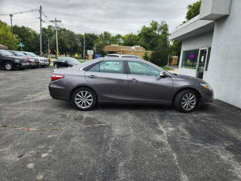 2015 Toyota Camry for sale at VINE STREET MOTOR CO in Urbana IL