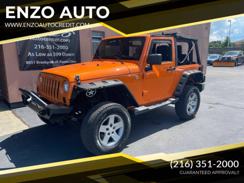 2013 Jeep Wrangler for sale at ENZO AUTO in Parma OH