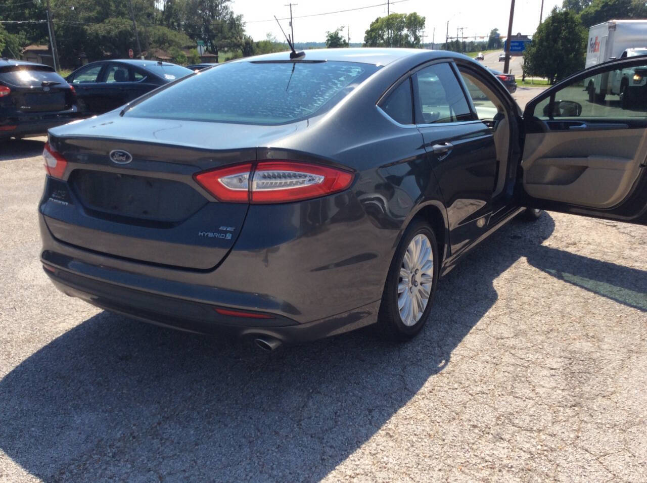 2016 Ford Fusion Hybrid for sale at SPRINGTIME MOTORS in Huntsville, TX