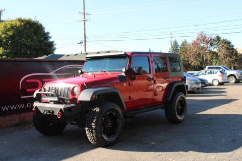 2012 Jeep Wrangler Unlimited for sale at Dream Auto Group in Shelby Township MI