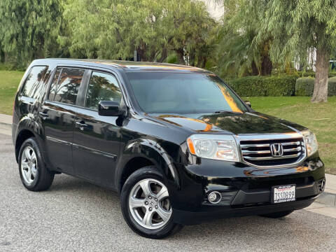 2013 Honda Pilot for sale at MILLENNIUM MOTORS in Van Nuys CA