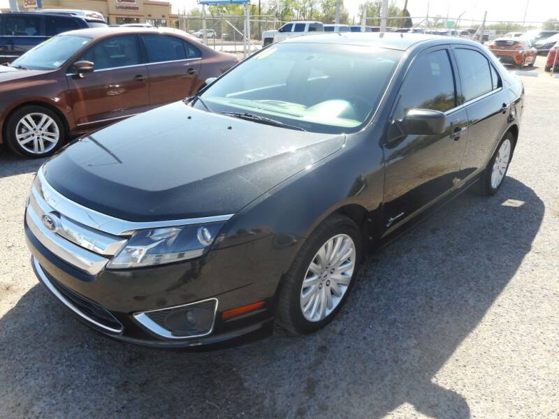 2010 Ford Fusion Hybrid for sale at AUGE'S SALES AND SERVICE in Belen NM