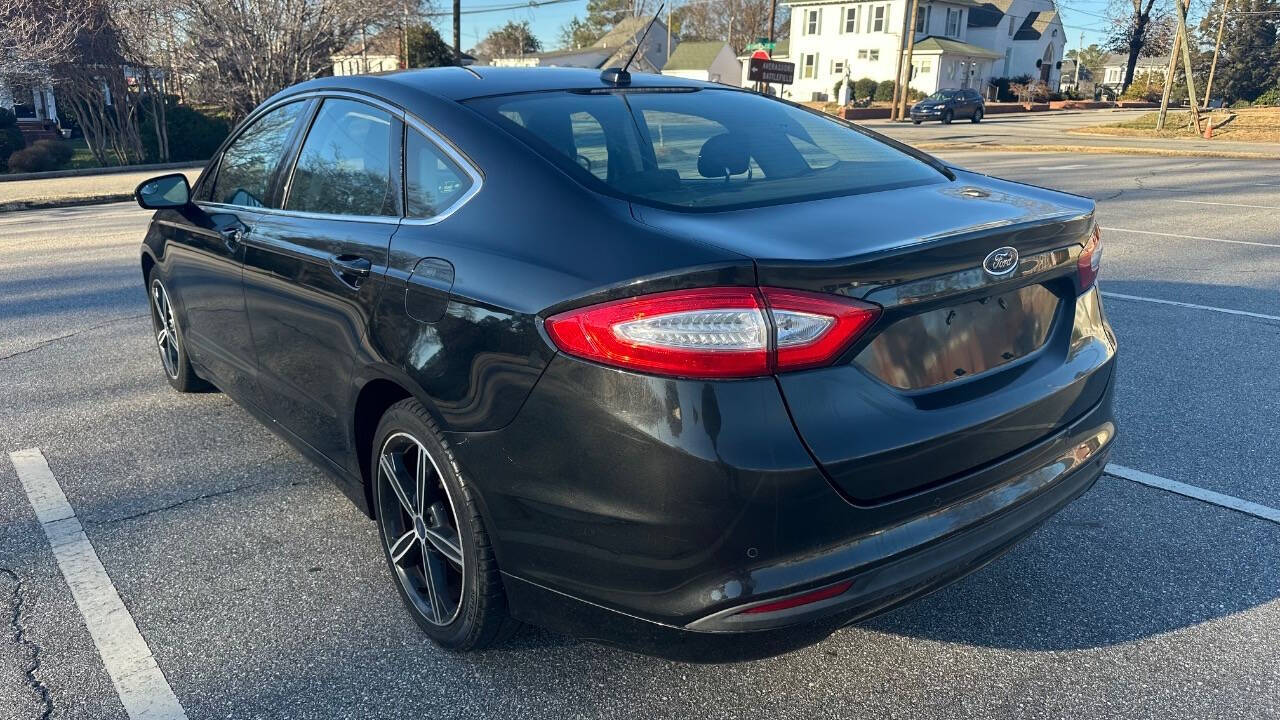 2014 Ford Fusion for sale at Caropedia in Dunn, NC