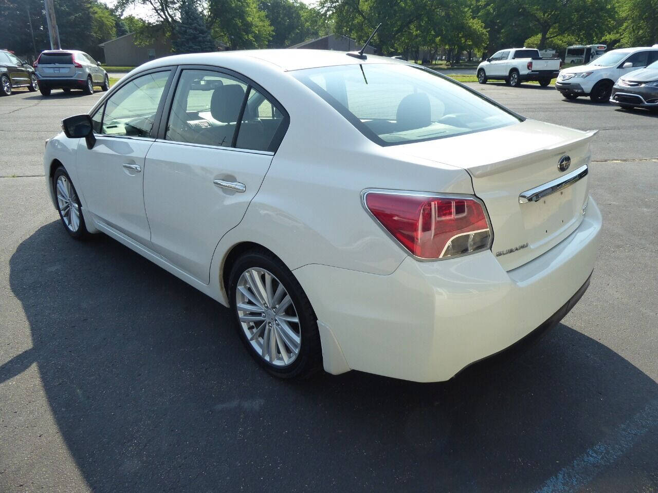 2015 Subaru Impreza for sale at Lakeshore Autos in Holland, MI