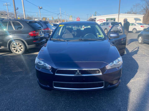 2014 Mitsubishi Lancer for sale at M & J Auto Sales in Attleboro MA