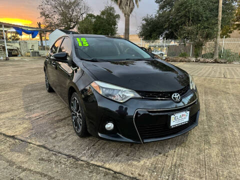 2015 Toyota Corolla for sale at De La Paz Auto Sales Inc. in Houston TX