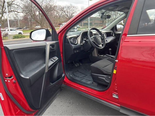Used 2014 Toyota RAV4 LE with VIN JTMZFREV0EJ011189 for sale in Madison, WI