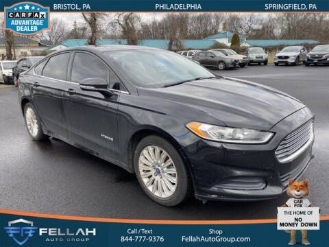 2014 Ford Fusion Hybrid for sale at Fellah Auto Group in Philadelphia PA