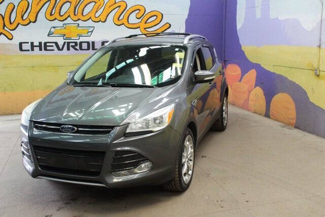 Used 2014 Ford Escape Titanium with VIN 1FMCU0JX0EUA12335 for sale in Grand Ledge, MI