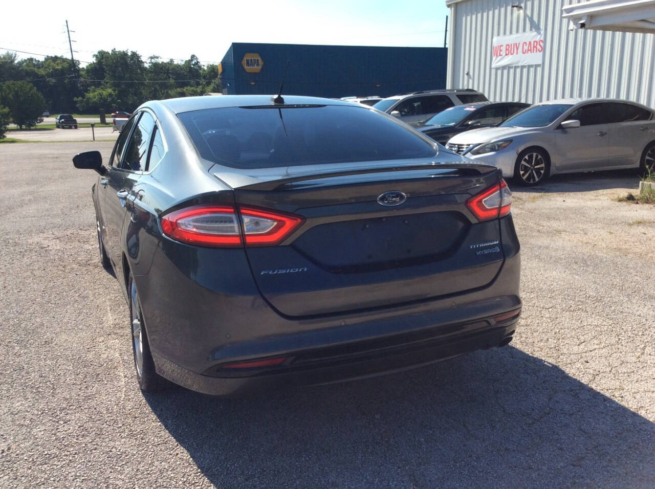 2015 Ford Fusion Hybrid for sale at SPRINGTIME MOTORS in Huntsville, TX