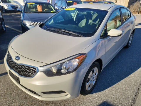 2014 Kia Forte for sale at Howe's Auto Sales in Lowell MA