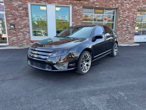 2012 Ford Fusion for sale at Ohio Car Mart in Elyria OH