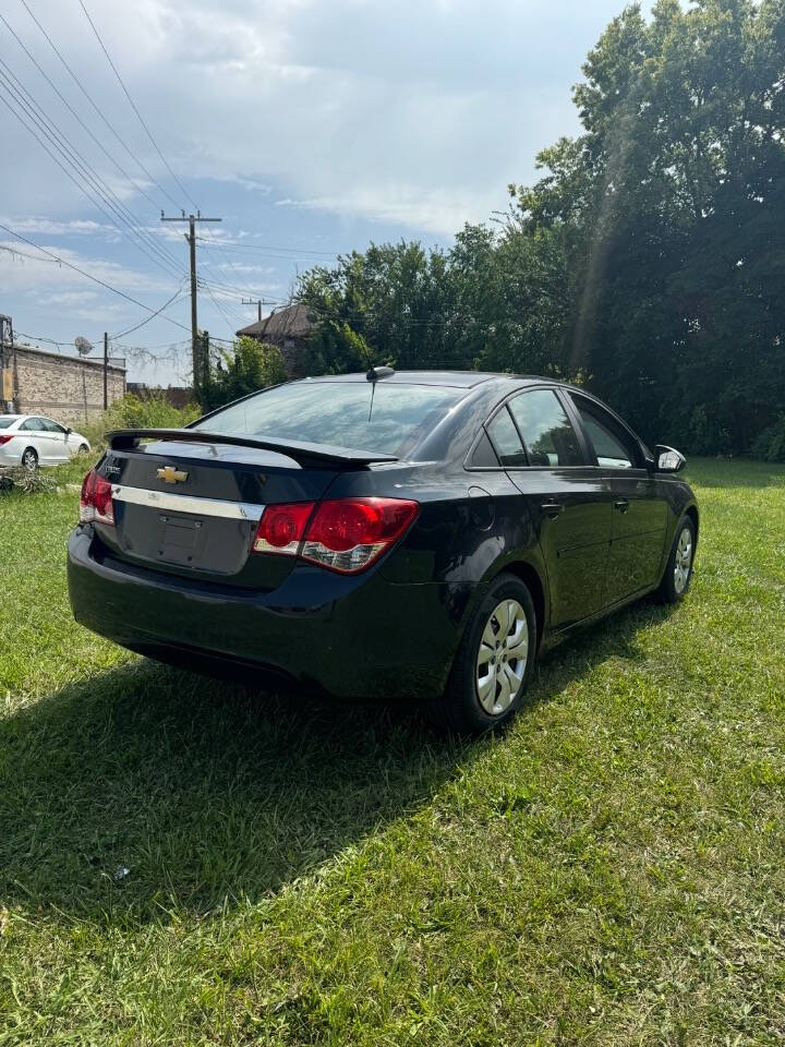 2015 Chevrolet Cruze for sale at H & H AUTO GROUP in Detroit, MI