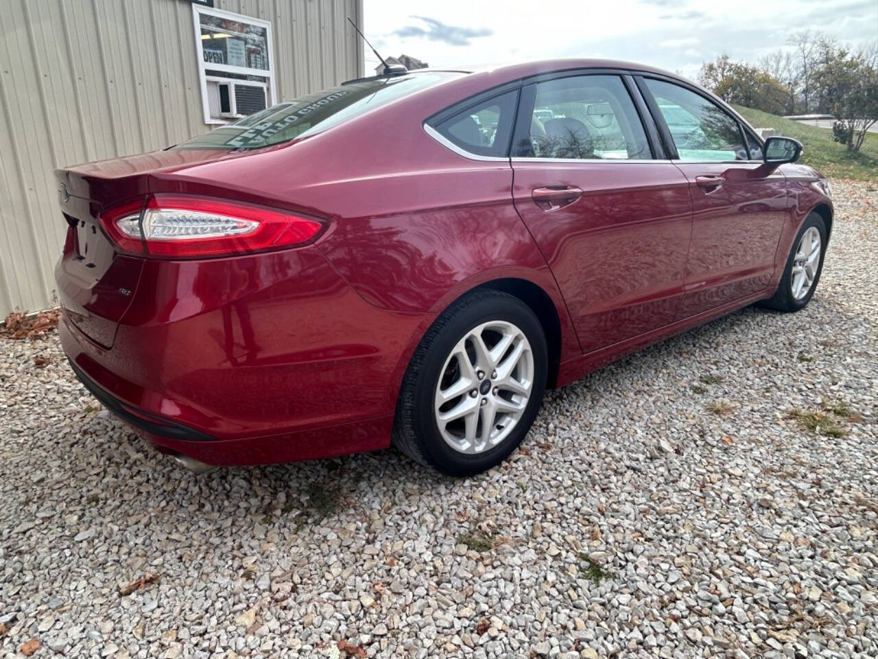 2014 Ford Fusion for sale at STRODES AUTO GROUP LLP in Malta, OH