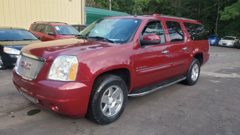 2007 GMC Yukon XL for sale at GEORGIA AUTO DEALER LLC in Buford GA