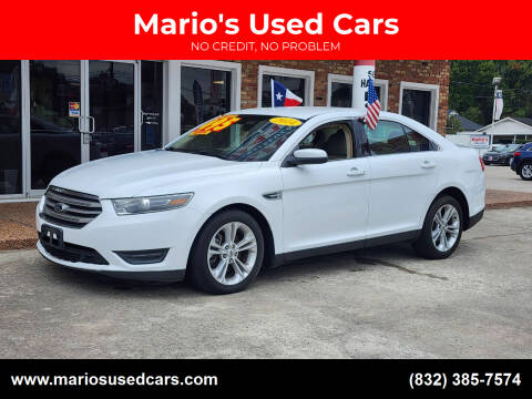 2014 Ford Taurus for sale at Mario's Used Cars - South Houston Location in South Houston TX