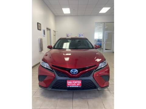 2018 Toyota Camry Hybrid for sale at DAN PORTER MOTORS in Dickinson ND