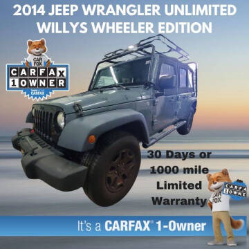 2014 Jeep Wrangler Unlimited for sale at Arch Auto Group in Eatonton GA