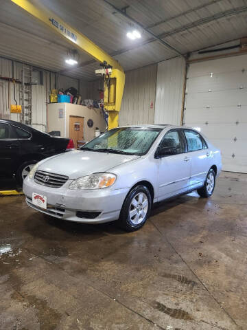 2004 Toyota Corolla for sale at WESTSIDE GARAGE LLC in Keokuk IA