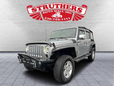 2014 Jeep Wrangler Unlimited for sale at STRUTHERS AUTO MALL in Austintown OH