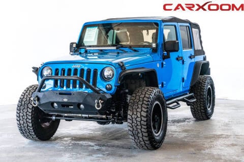 2011 Jeep Wrangler Unlimited for sale at CARXOOM in Marietta GA