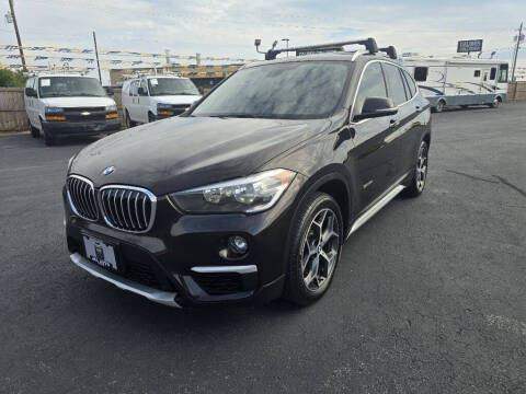 2018 BMW X1 for sale at J & L AUTO SALES in Tyler TX