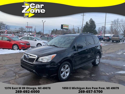 2014 Subaru Forester for sale at Car Zone in Otsego MI