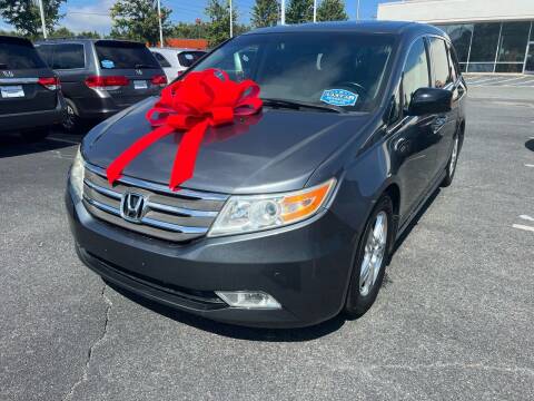 2011 Honda Odyssey for sale at Charlotte Auto Group, Inc in Monroe NC