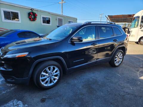 2014 Jeep Cherokee for sale at E and M Auto Sales in Bloomington CA