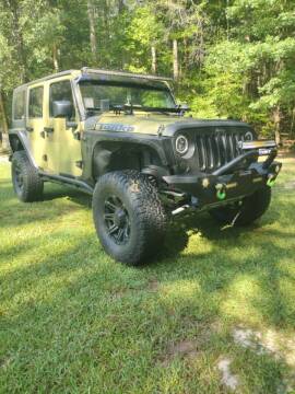 2013 Jeep Wrangler Unlimited for sale at Good To Go Auto Sales in Mcdonough GA